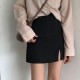 Split short skirt women's 2020 autumn Student Korean solid color A-line half skirt high waist shows thin and light proof buttock skirt